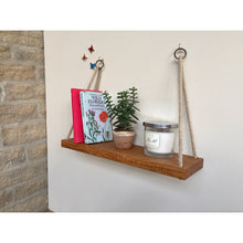 Load image into Gallery viewer, Oak hanging shelf | plant shelf | plant display | wall decor | shelving | plant stand | rope shelf | housewarming gift.
